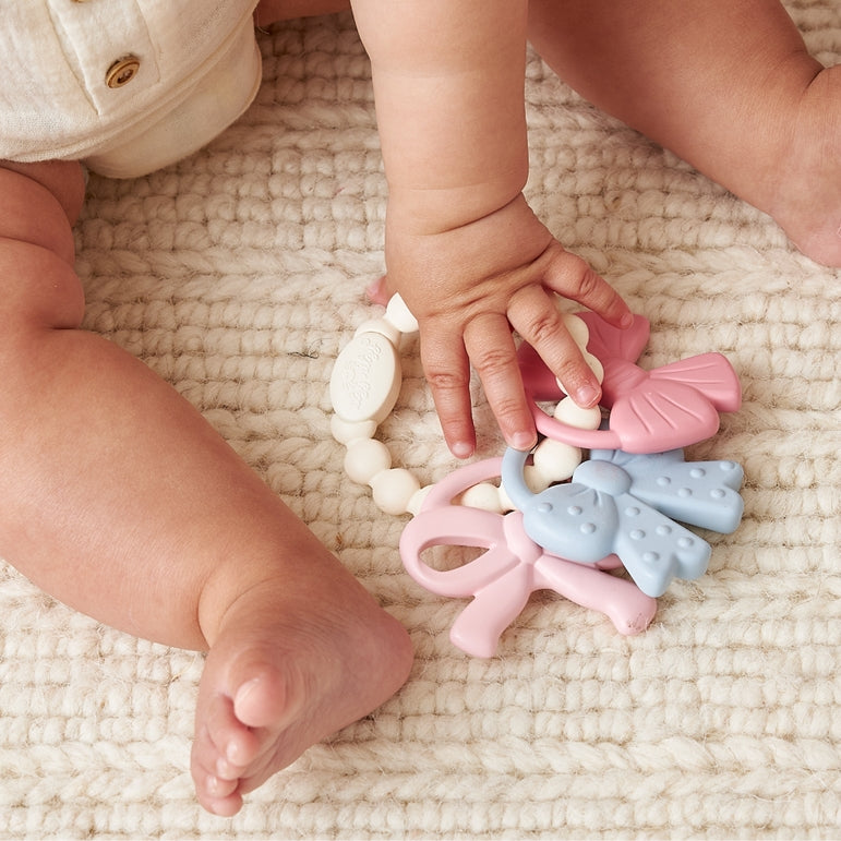 Itzy Trio™ 100% Silicone Multi-Textured Teether- Bows