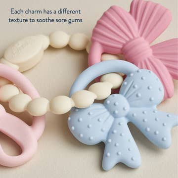 Itzy Trio™ 100% Silicone Multi-Textured Teether- Bows