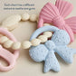 Itzy Trio™ 100% Silicone Multi-Textured Teether- Bows